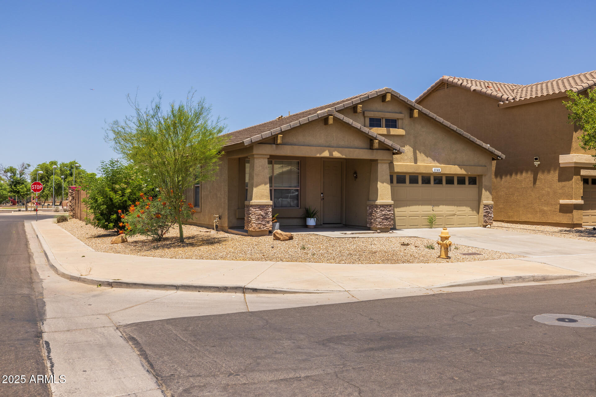 3148 West Maldonado Road Phoenix, AZ 85041 - Photo 3 of 31 a front view of a house with a yard