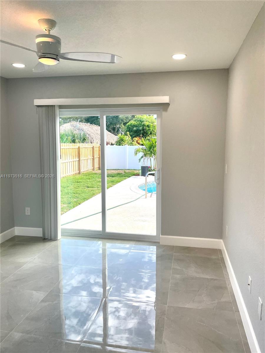 1280 West Camino Real, Unit 1280 Boca Raton, FL 33486 - Photo 21 of 26 a view of an empty room and window
