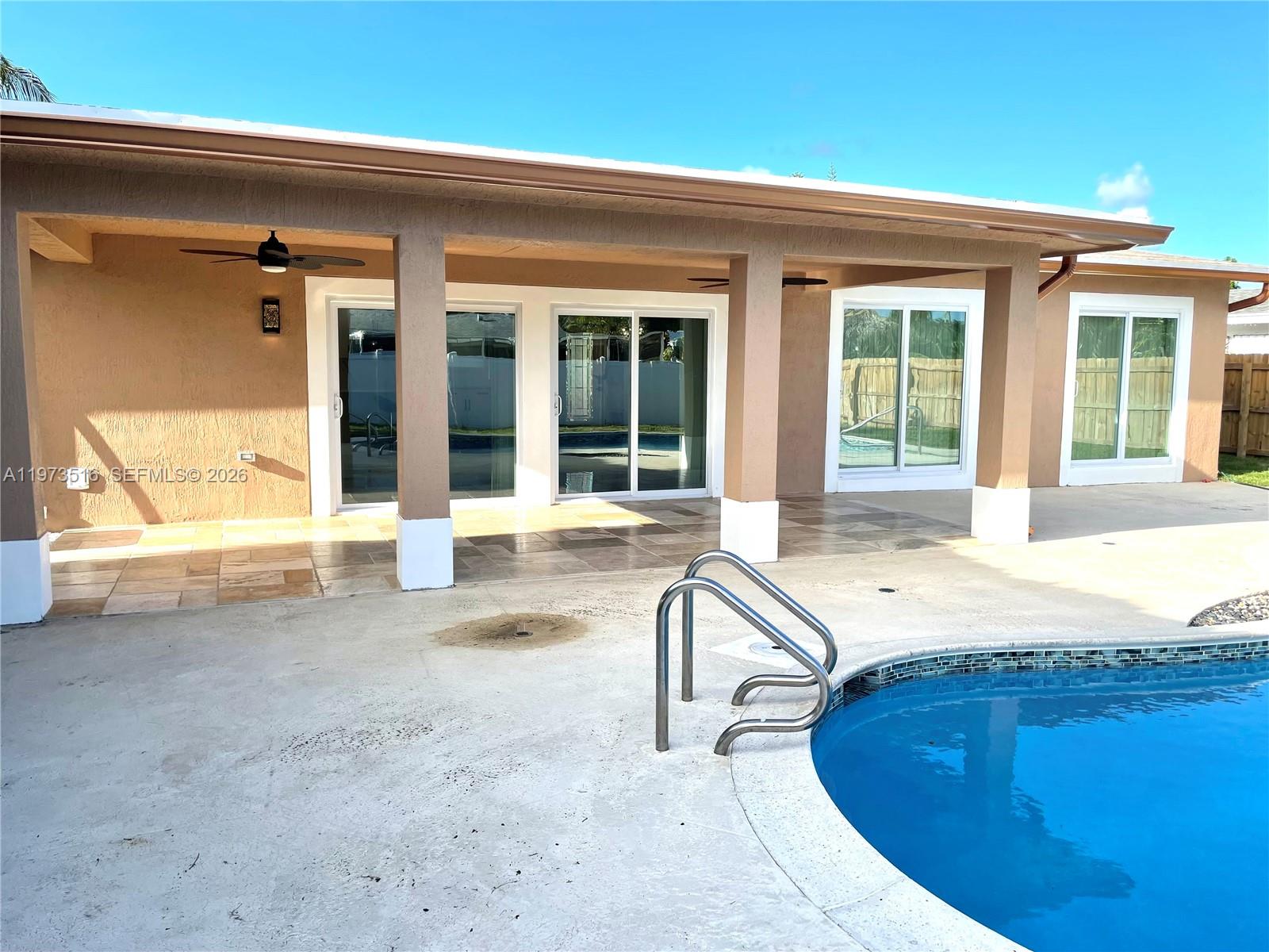 1280 West Camino Real, Unit 1280 Boca Raton, FL 33486 - Photo 26 of 26 a view of a house with a swimming pool