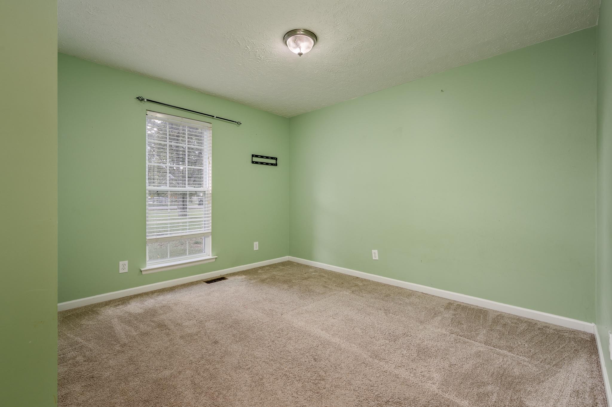 701 Crescent Road Murfreesboro, TN 37128 - Photo 14 of 22 an empty room with windows