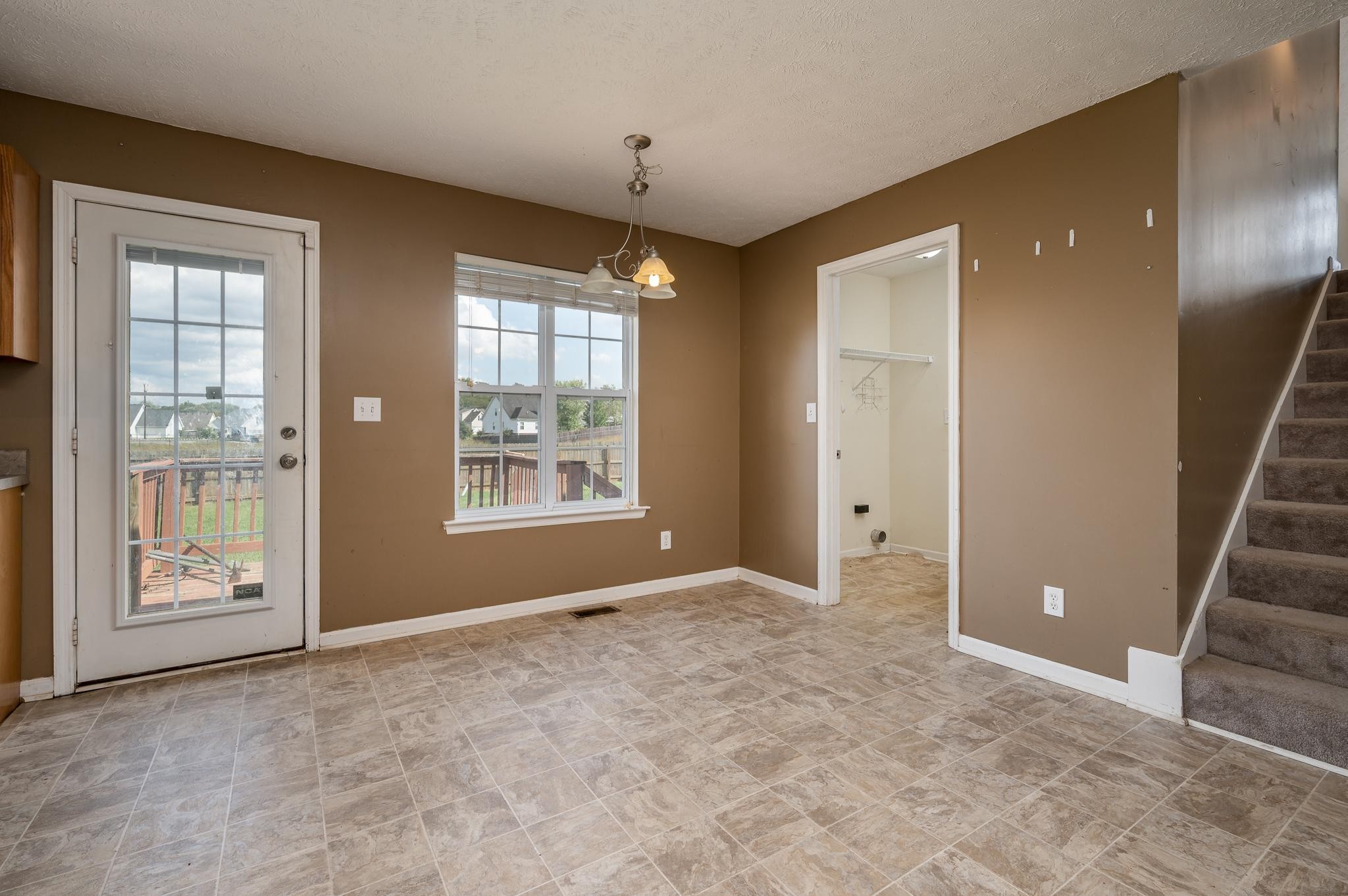 701 Crescent Road Murfreesboro, TN 37128 - Photo 8 of 22 a view of an empty room with a window