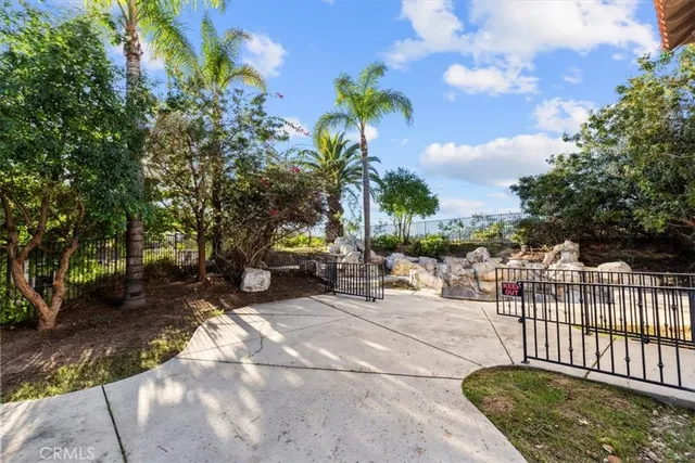 a view of a backyard of the house