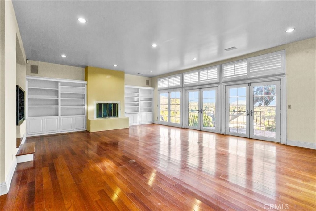 1500 Kashlan Road La Habra Heights, CA 90631 - Photo 23 of 62 a view of an empty room with a window and wooden floor