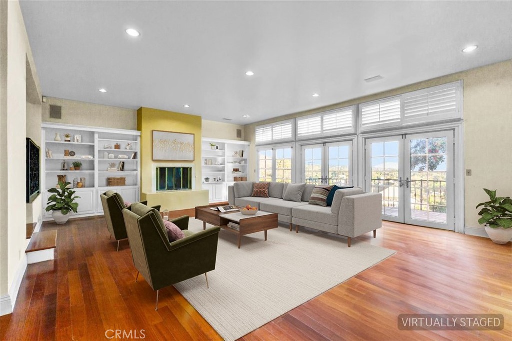 1500 Kashlan Road La Habra Heights, CA 90631 - Photo 24 of 62 a living room with furniture wooden floor and a large window