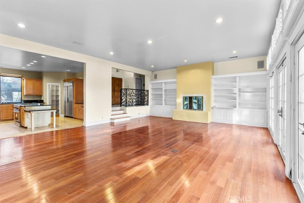 1500 Kashlan Road La Habra Heights, CA 90631 - Photo 25 of 62 a view of a big room with wooden floor and a kitchen