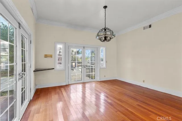a large kitchen with stainless steel appliances granite countertop a stove and a sink