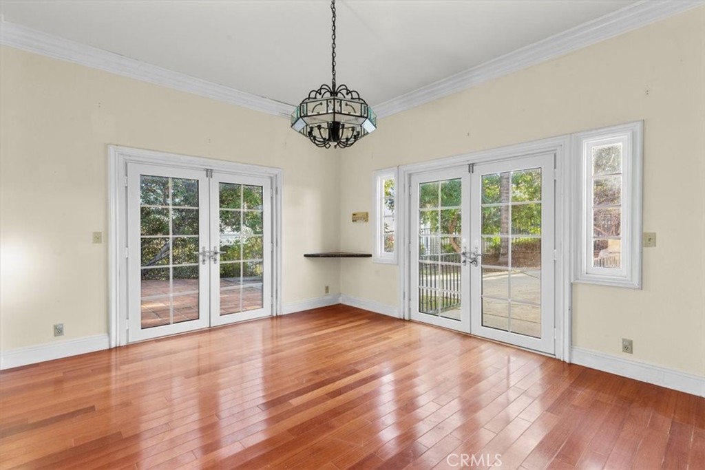 1500 Kashlan Road La Habra Heights, CA 90631 - Photo 28 of 62 a view of an empty room with wooden floor and a window