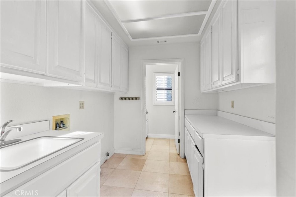 1500 Kashlan Road La Habra Heights, CA 90631 - Photo 38 of 62 a view of a kitchen with sink stove and cabinets