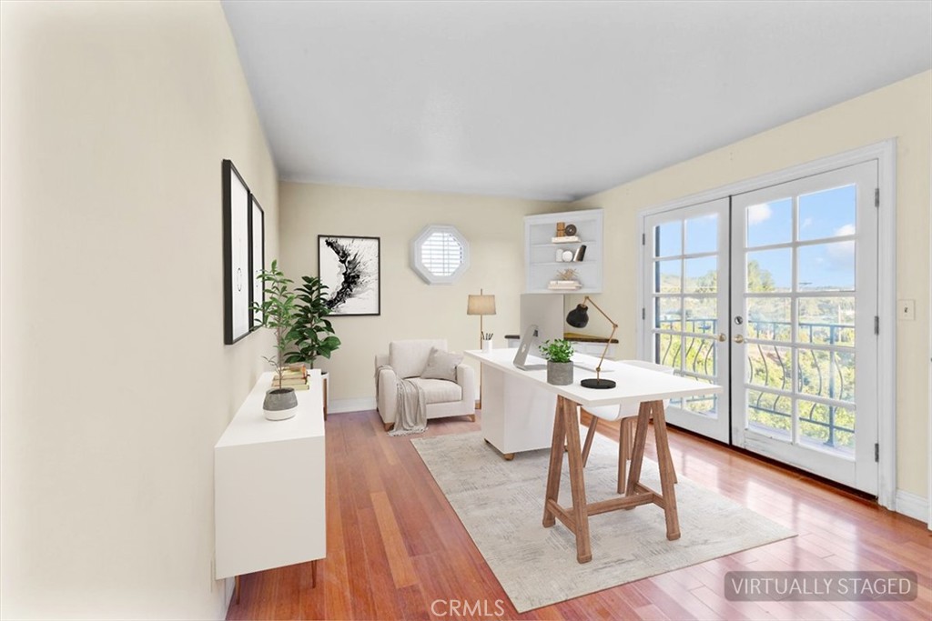 1500 Kashlan Road La Habra Heights, CA 90631 - Photo 49 of 62 a living room with furniture large window and wooden floor
