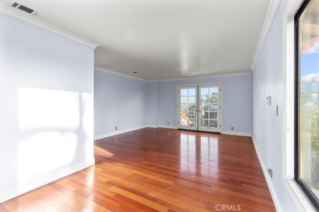 1500 Kashlan Road La Habra Heights, CA 90631 - Photo 61 of 62 a view of an empty room with wooden floor and a window