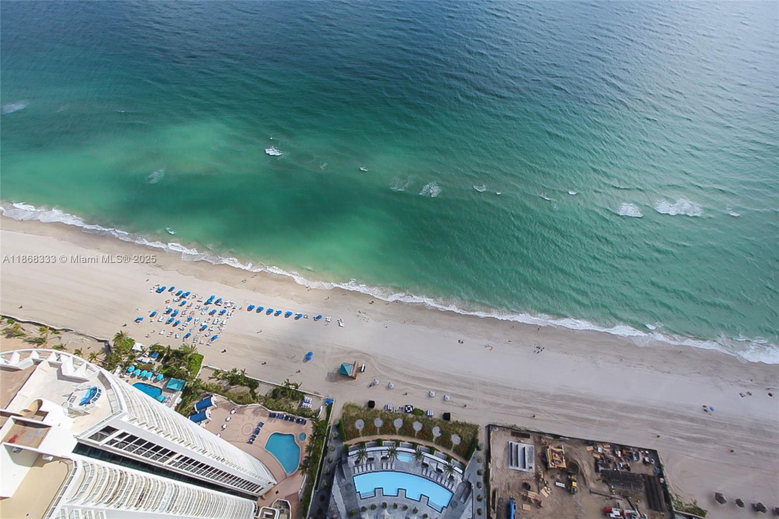 18555 Collins Avenue, Unit 4605 Sunny Isles Beach, FL 33160 - Photo 39 of 40 an aerial view of a highlighted house