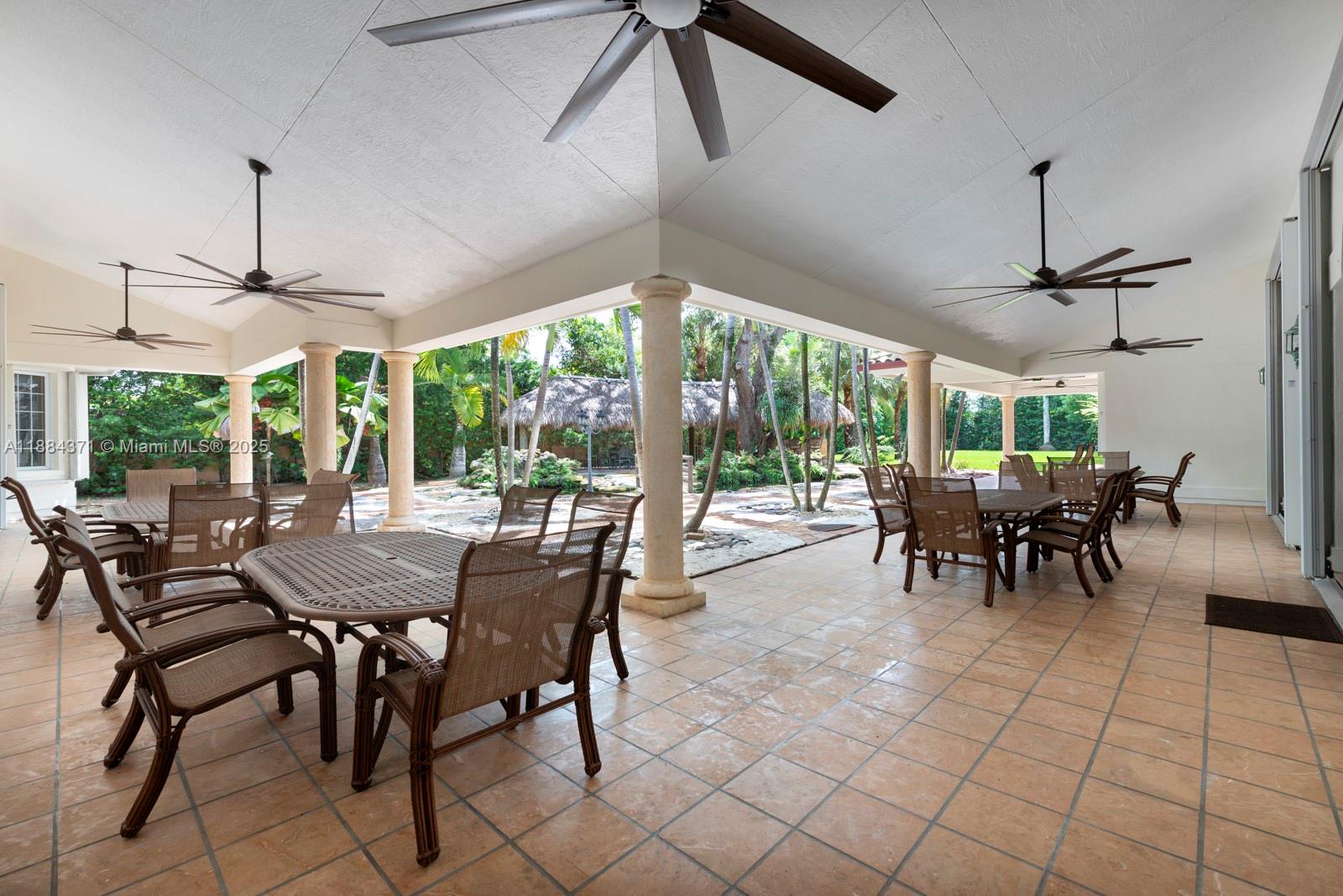 9360 Southwest 66th Street Miami, FL 33173 - Photo 29 of 64 a view of a dining room with furniture window and outside view