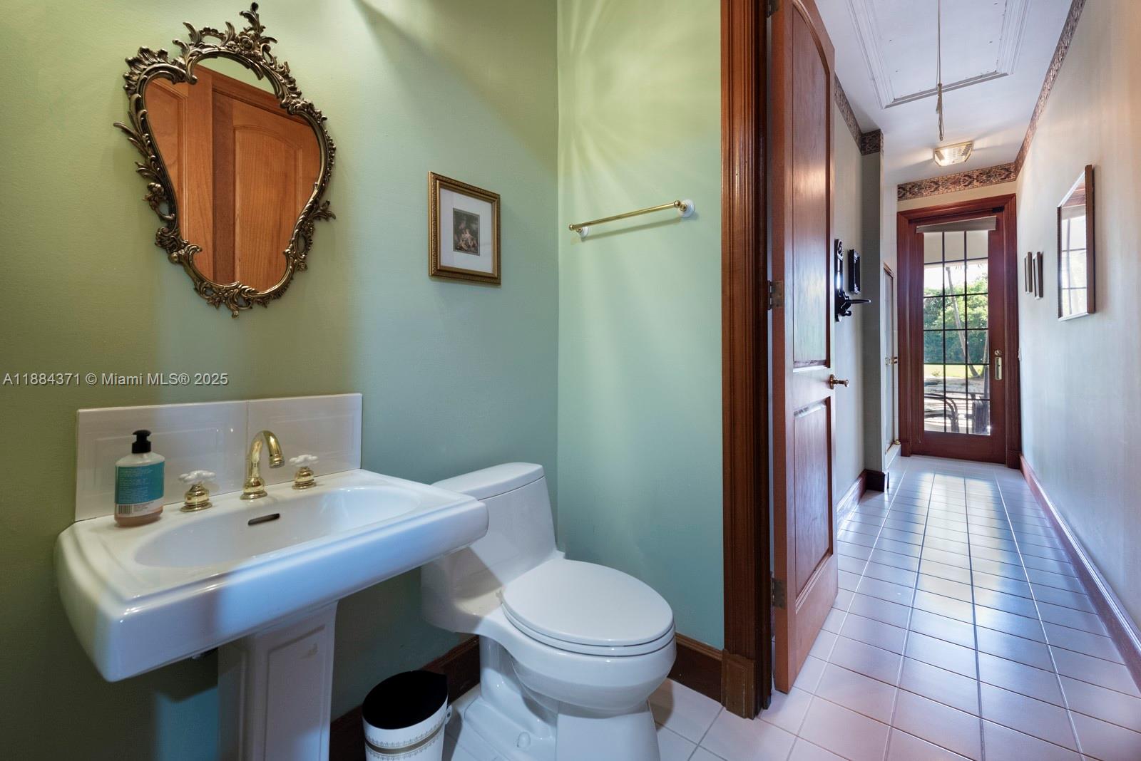 9360 Southwest 66th Street Miami, FL 33173 - Photo 37 of 64 a bathroom with a sink toilet and shower