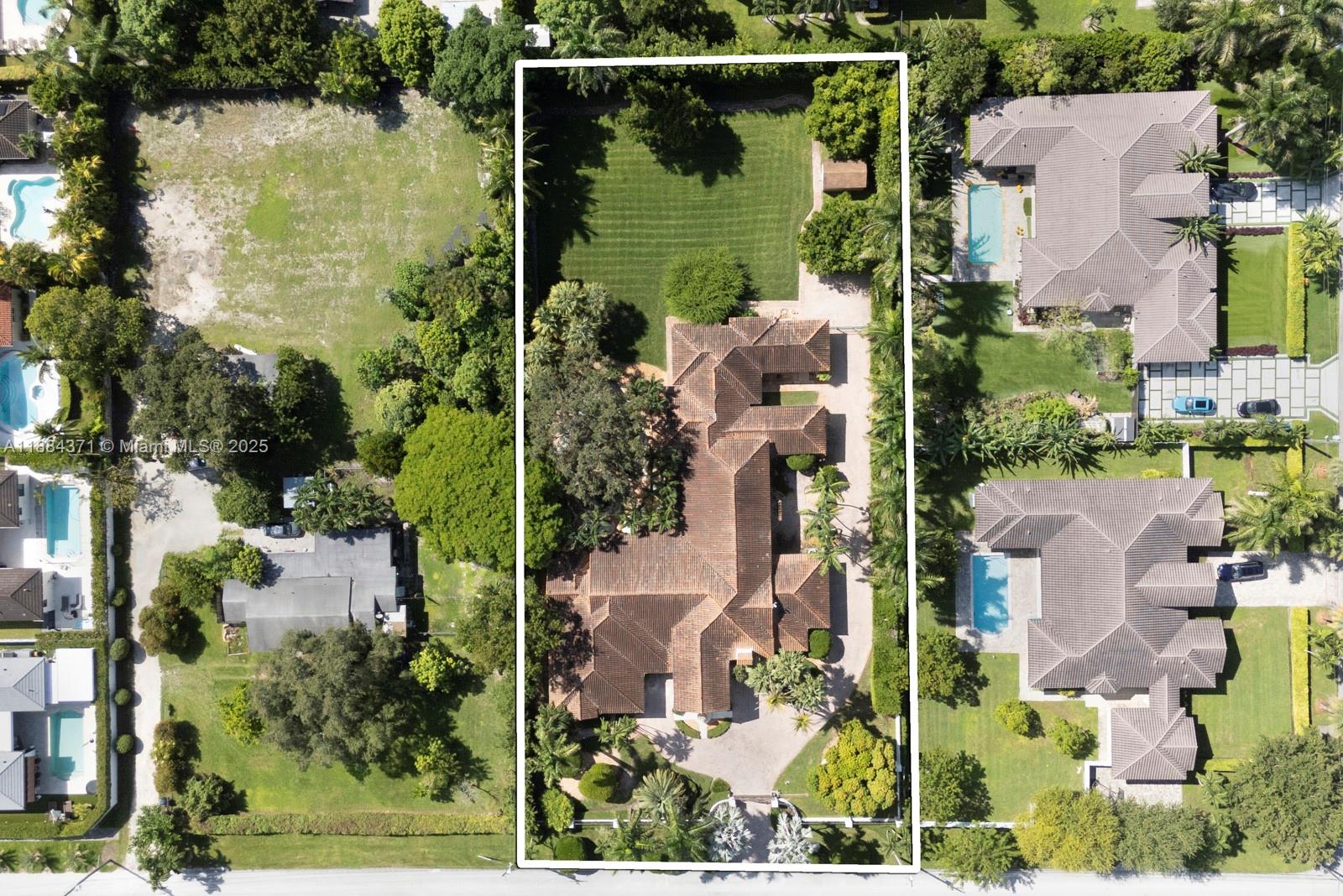 9360 Southwest 66th Street Miami, FL 33173 - Photo 56 of 64 an aerial view of houses with yard