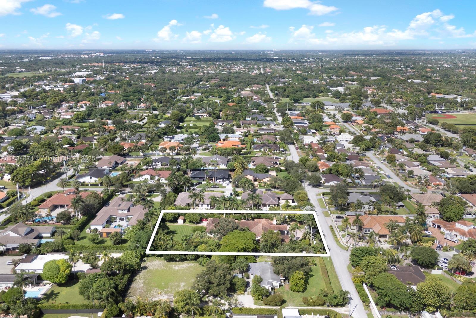 9360 Southwest 66th Street Miami, FL 33173 - Photo 58 of 64 an aerial view of residential houses with outdoor space