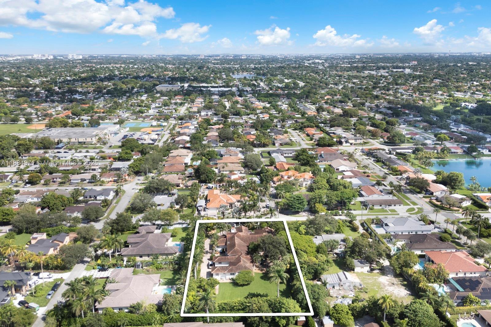 9360 Southwest 66th Street Miami, FL 33173 - Photo 59 of 64 an aerial view of residential houses with city view