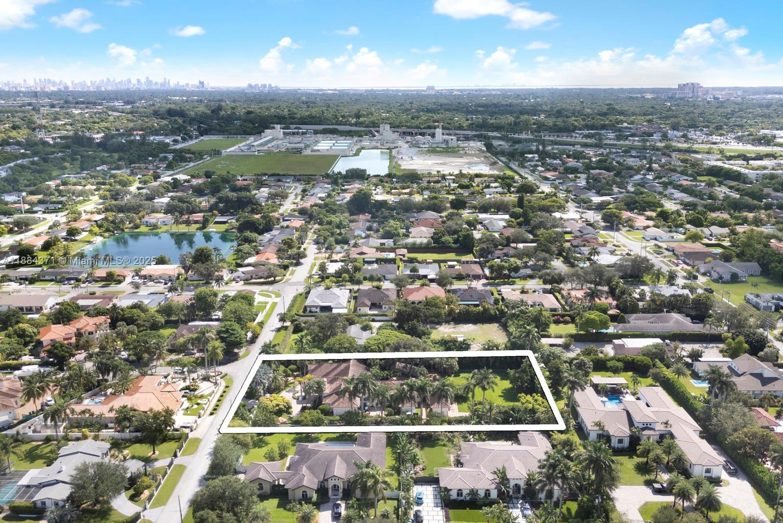 9360 Southwest 66th Street Miami, FL 33173 - Photo 60 of 64 an aerial view of residential houses with outdoor space