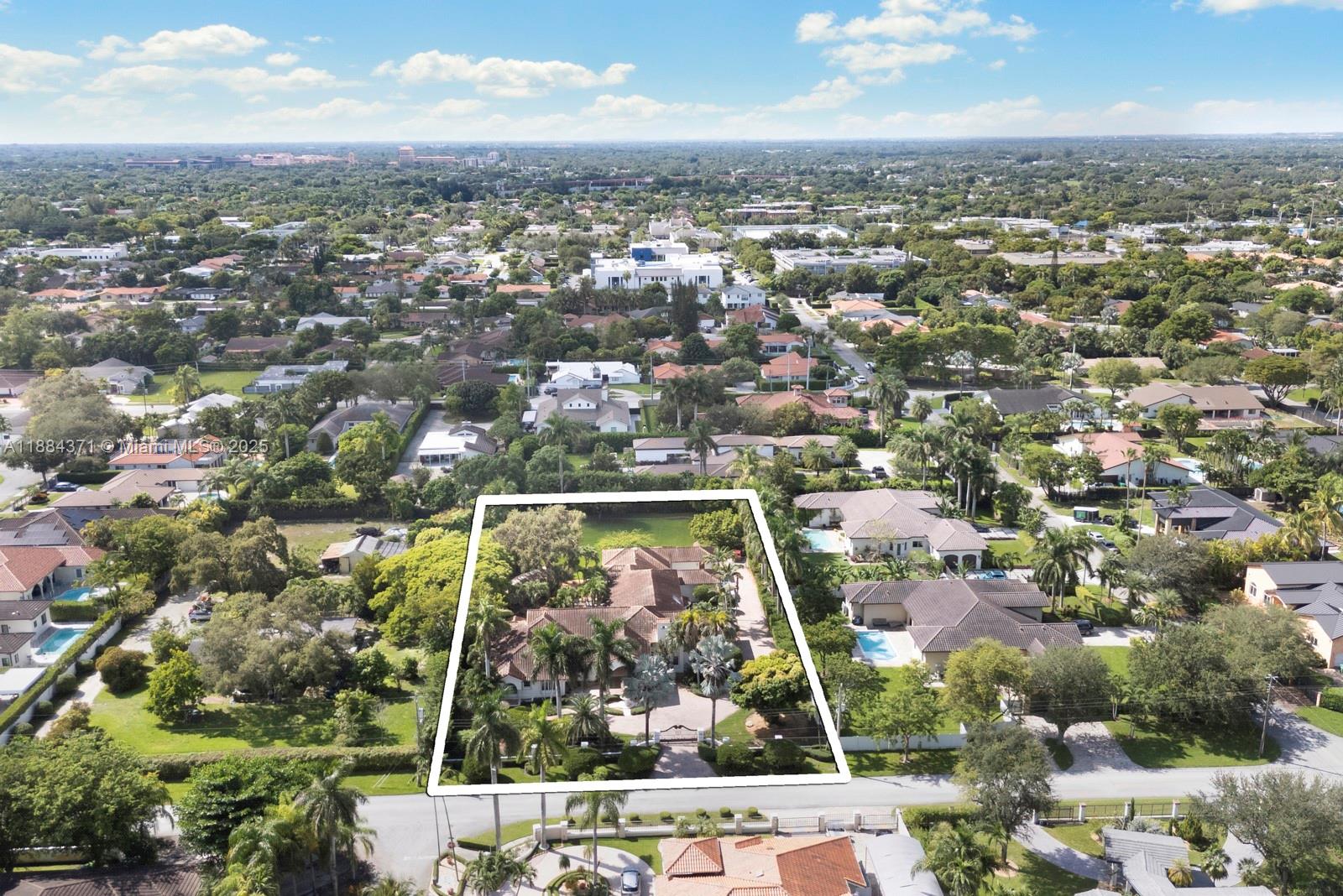 9360 Southwest 66th Street Miami, FL 33173 - Photo 61 of 64 an aerial view of residential houses with city view