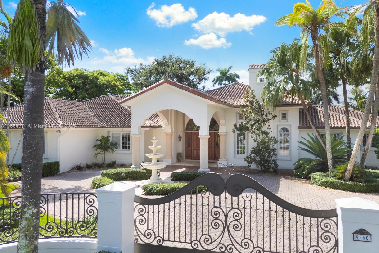 9360 Southwest 66th Street Miami, FL 33173 - Photo 63 of 64 a front view of house with yard outdoor seating and barbeque oven