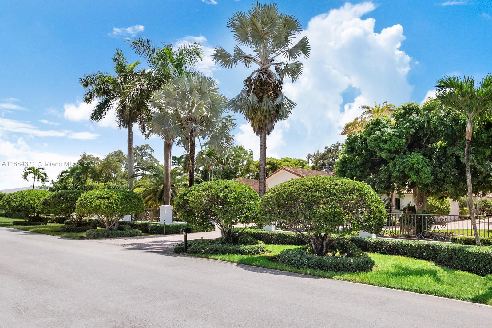 9360 Southwest 66th Street Miami, FL 33173 - Photo 8 of 64 a view of a street with a houses