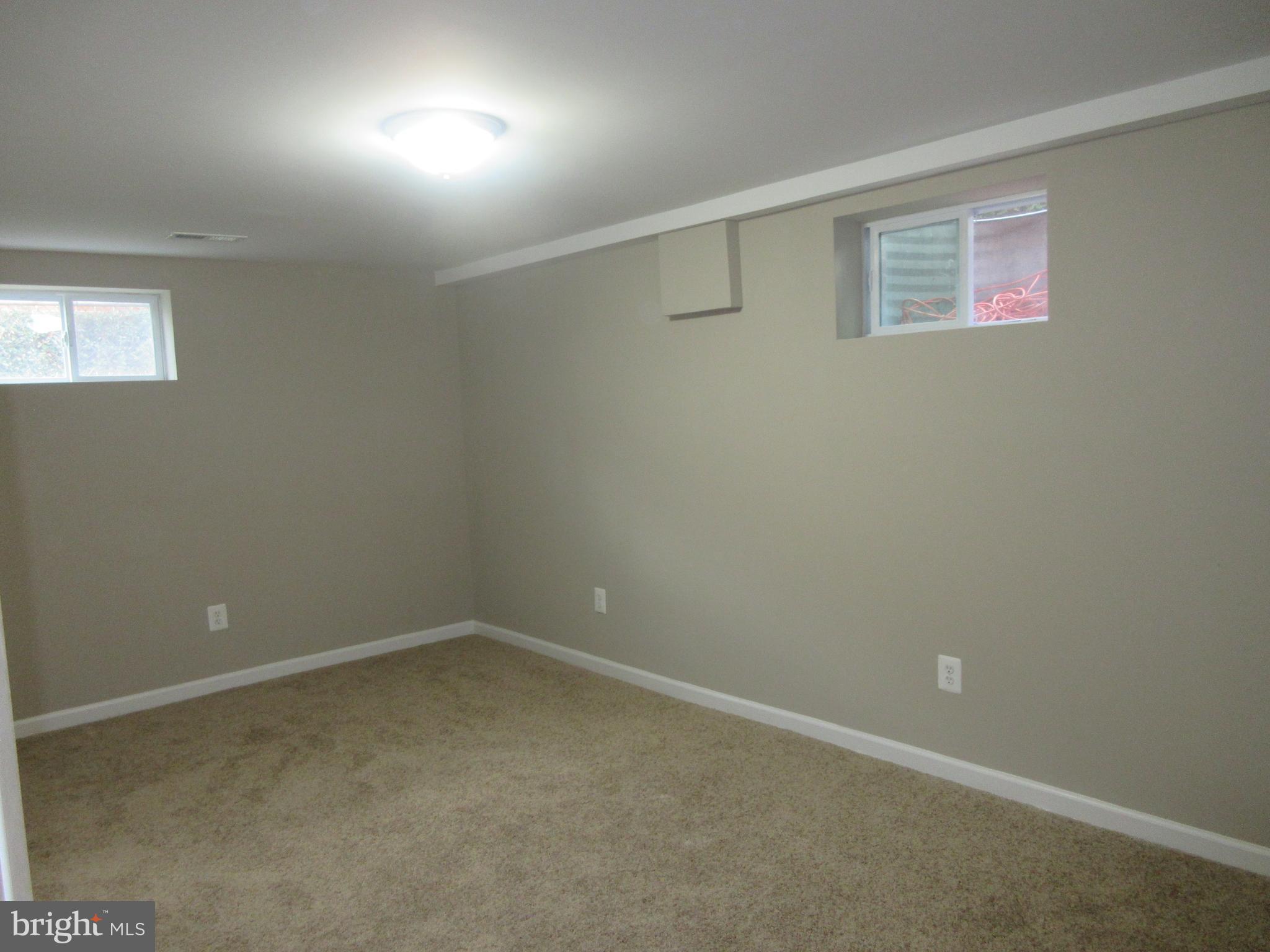 4801 Nantucket Road College Park, MD 20740 - Photo 15 of 19 Bedroom- Large downstairs bedroom