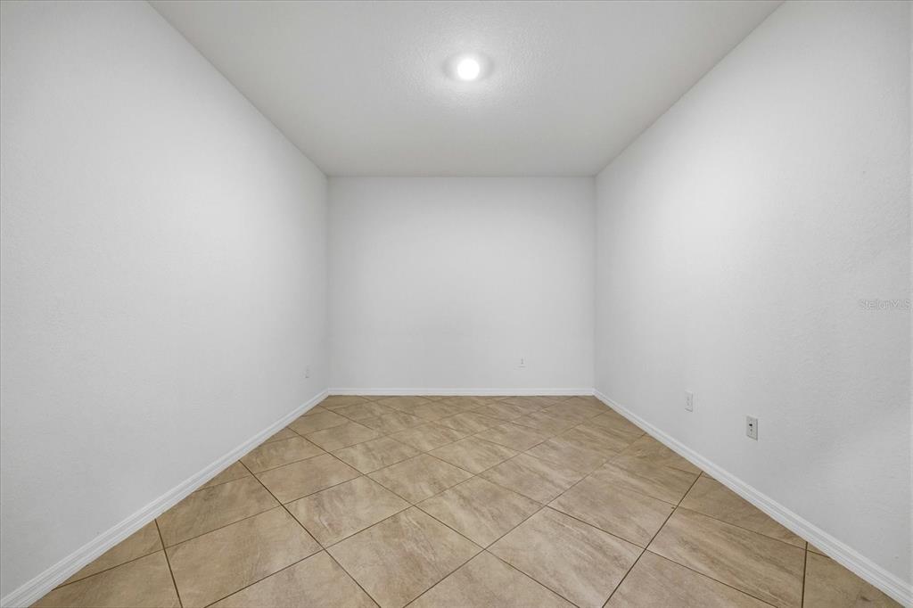 2607 Avolet Court Lakewood Ranch, FL 34211 - Photo 15 of 56 an empty room with white walls