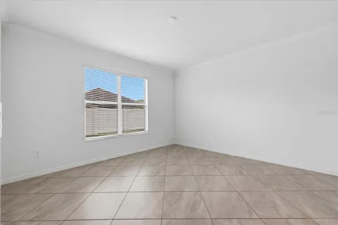 a bathroom with a granite countertop sink a mirror and a shower