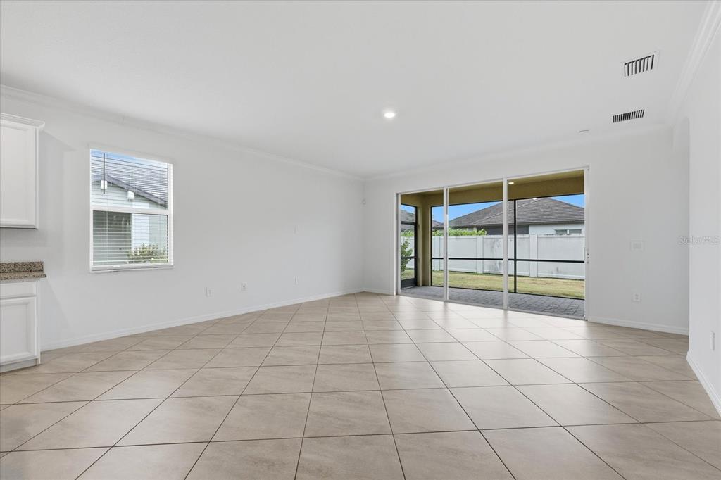 2607 Avolet Court Lakewood Ranch, FL 34211 - Photo 7 of 56 a view of an empty room with a window