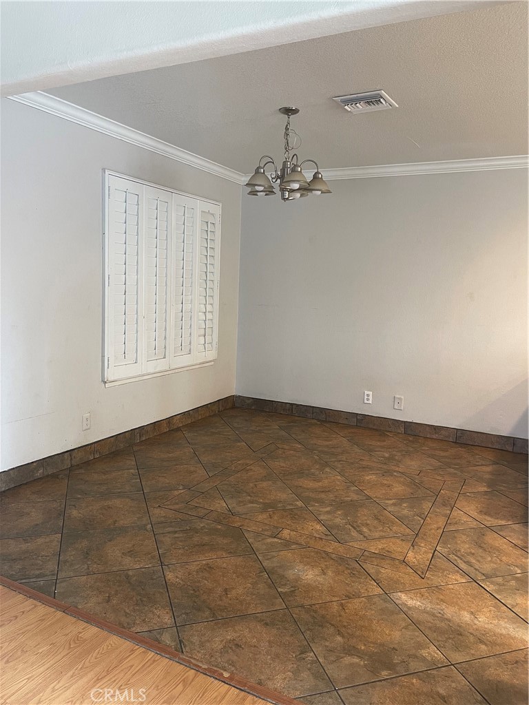 26380 Erwin Court Hemet, CA 92544 - Photo 11 of 12 a view of an empty room with a window