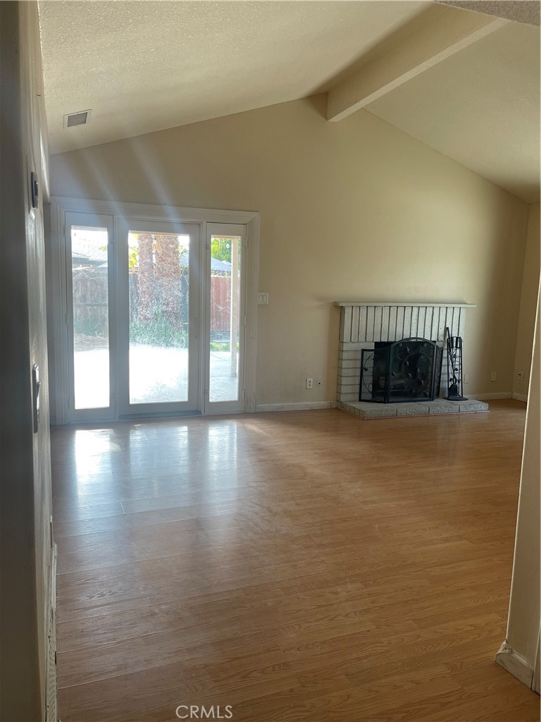 26380 Erwin Court Hemet, CA 92544 - Photo 5 of 12 a view of wooden floor and windows in an empty room