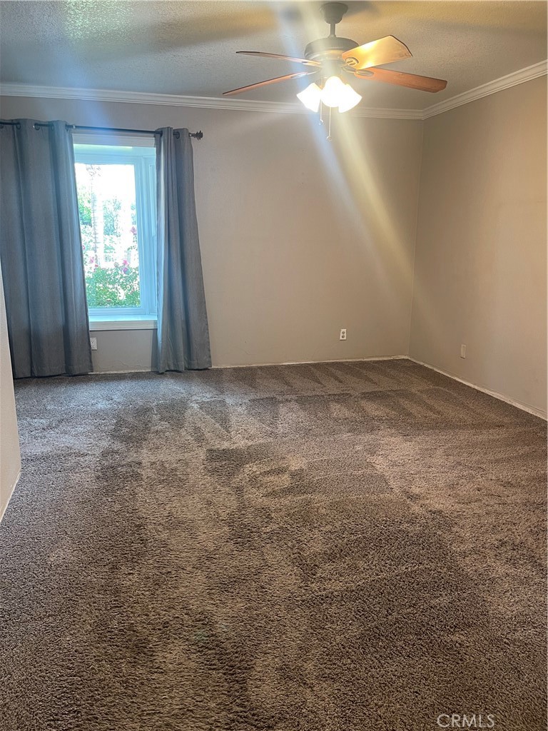 26380 Erwin Court Hemet, CA 92544 - Photo 7 of 12 a view of a big room with windows and closet