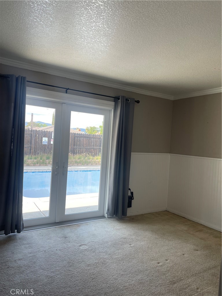 26380 Erwin Court Hemet, CA 92544 - Photo 9 of 12 an empty room with windows