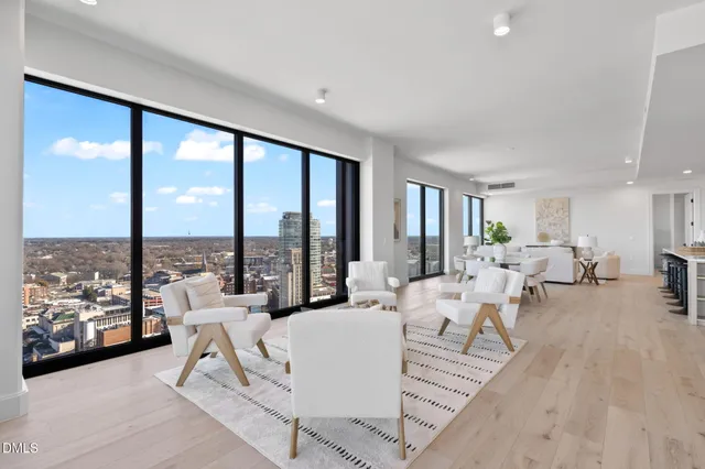 a spacious bedroom with a bed and a window