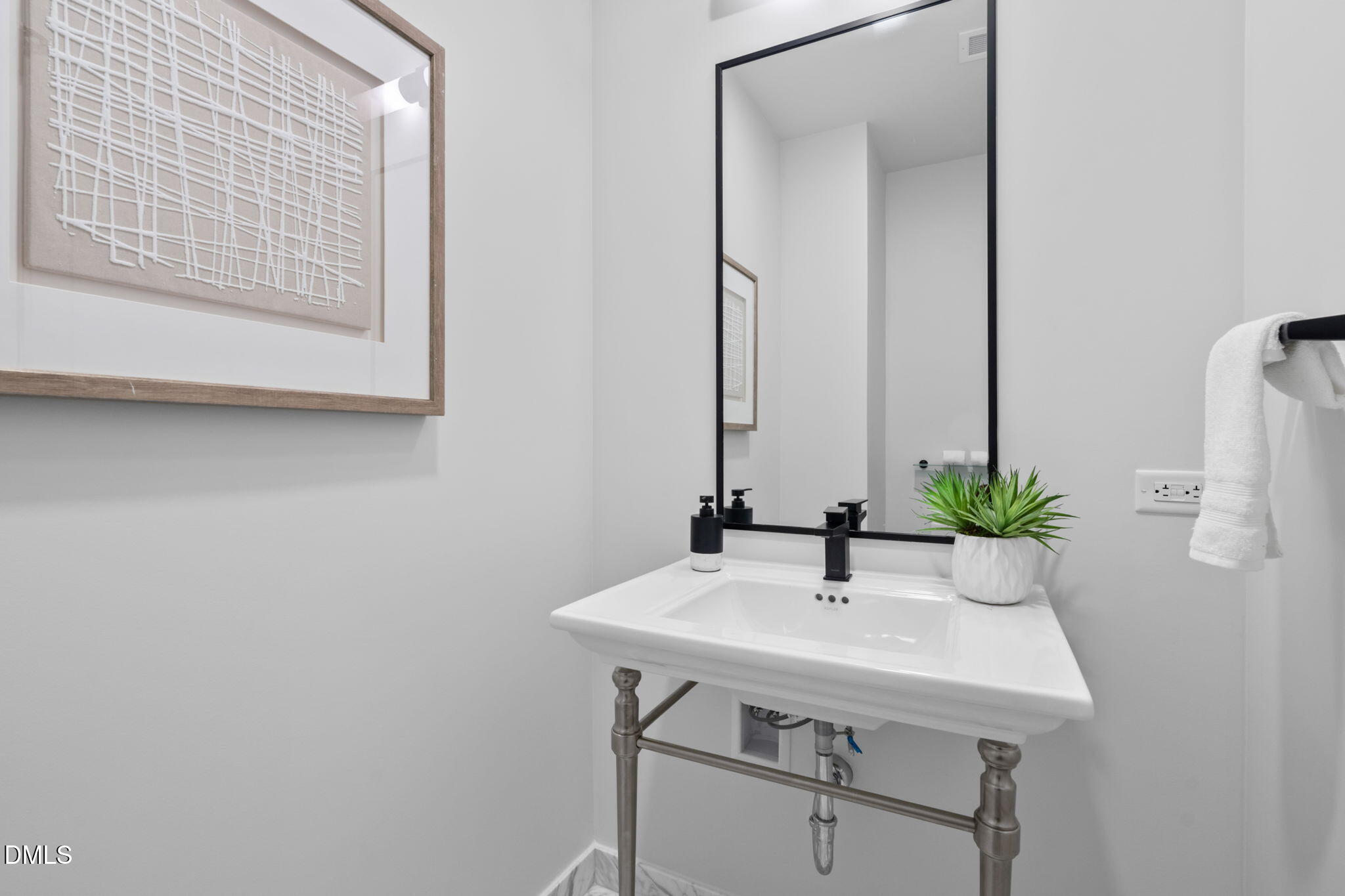 115 Morris Street, Unit 2502 Durham, NC 27701 - Photo 28 of 72 a bathroom with a sink and a mirror