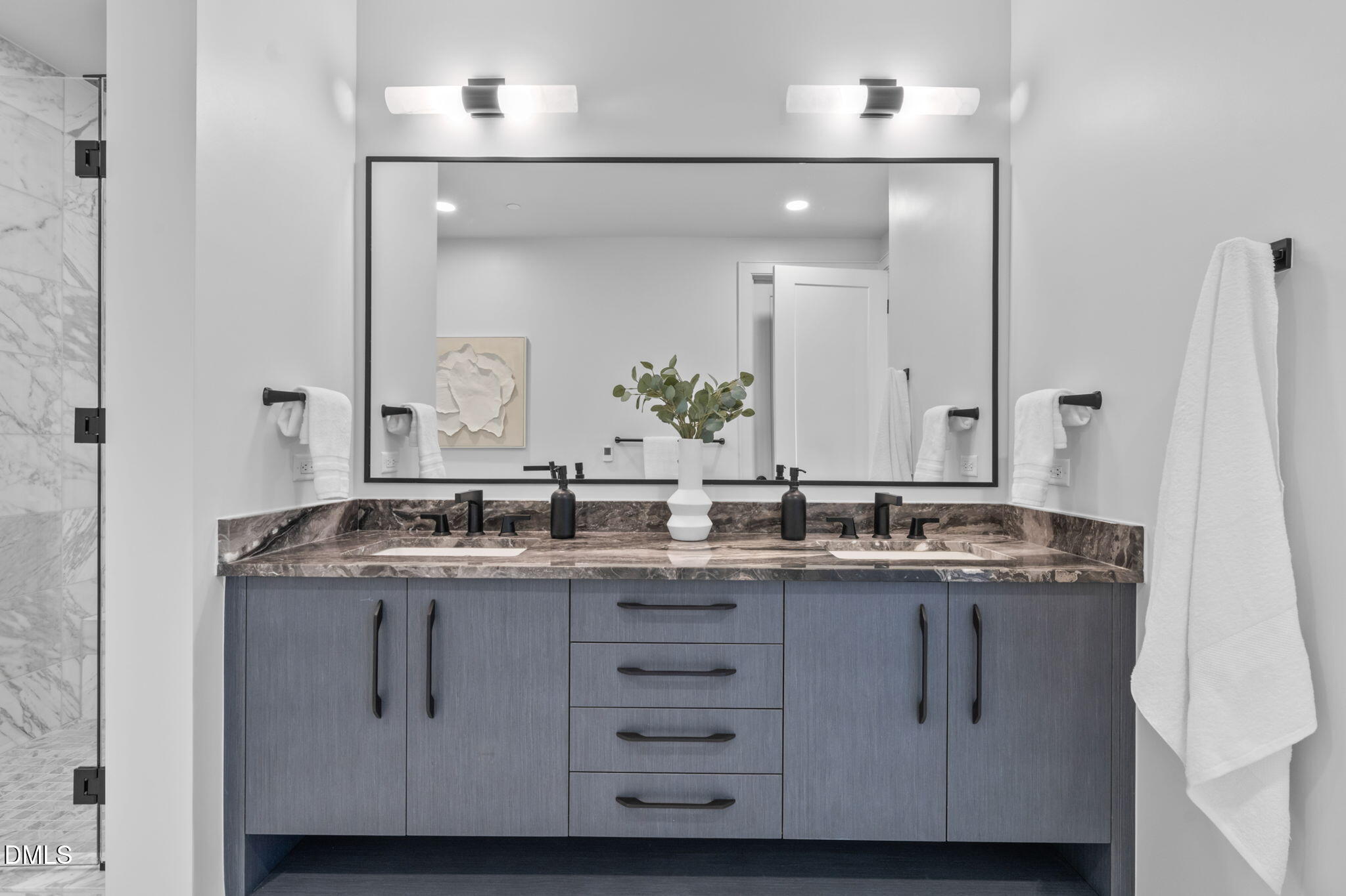 115 Morris Street, Unit 2502 Durham, NC 27701 - Photo 34 of 72 a bathroom with a granite countertop sink and a mirror