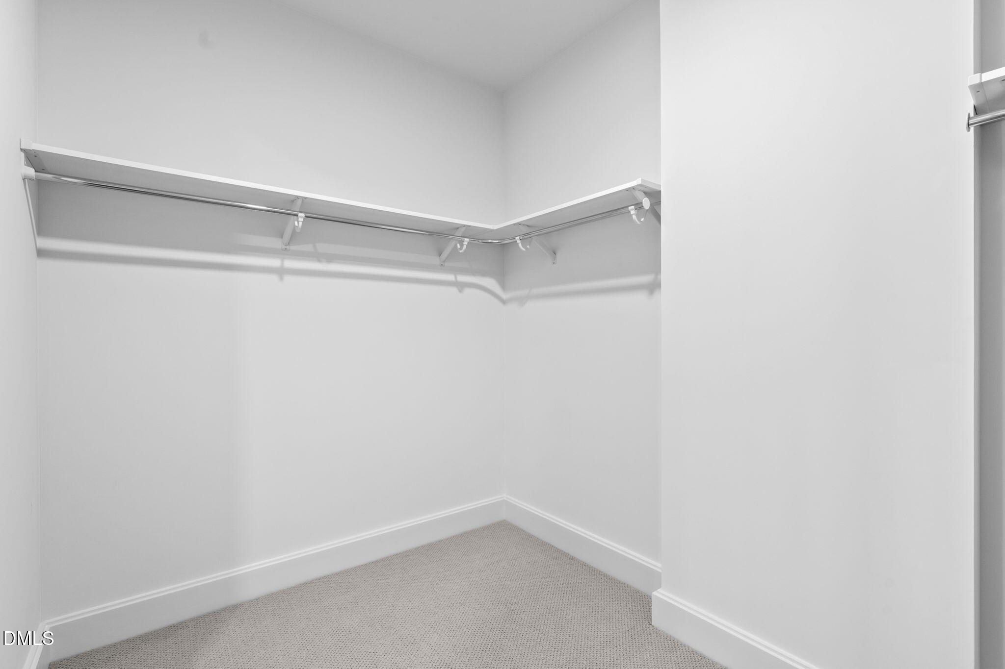 115 Morris Street, Unit 2502 Durham, NC 27701 - Photo 39 of 72 a view of an empty walk in closet