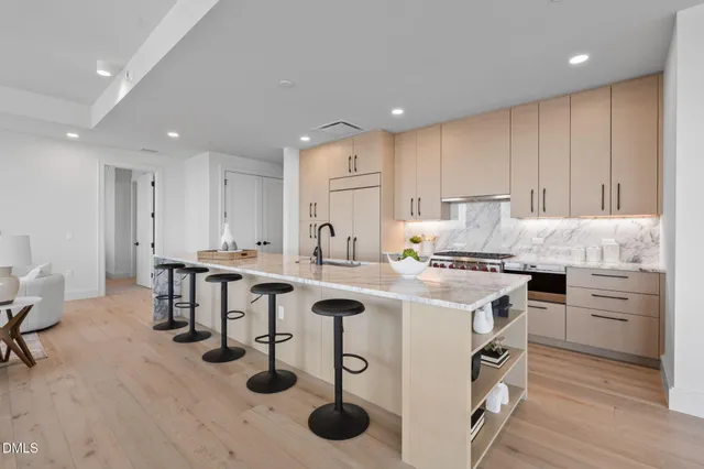 a close up of a stove top oven sitting on a floor