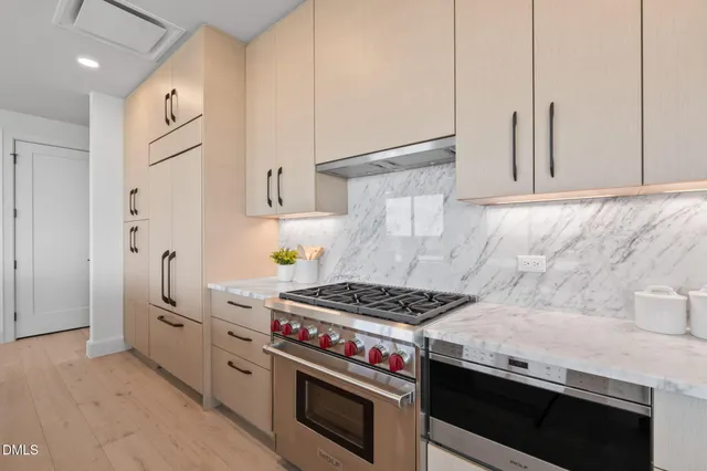 a view of living room with a potted plant
