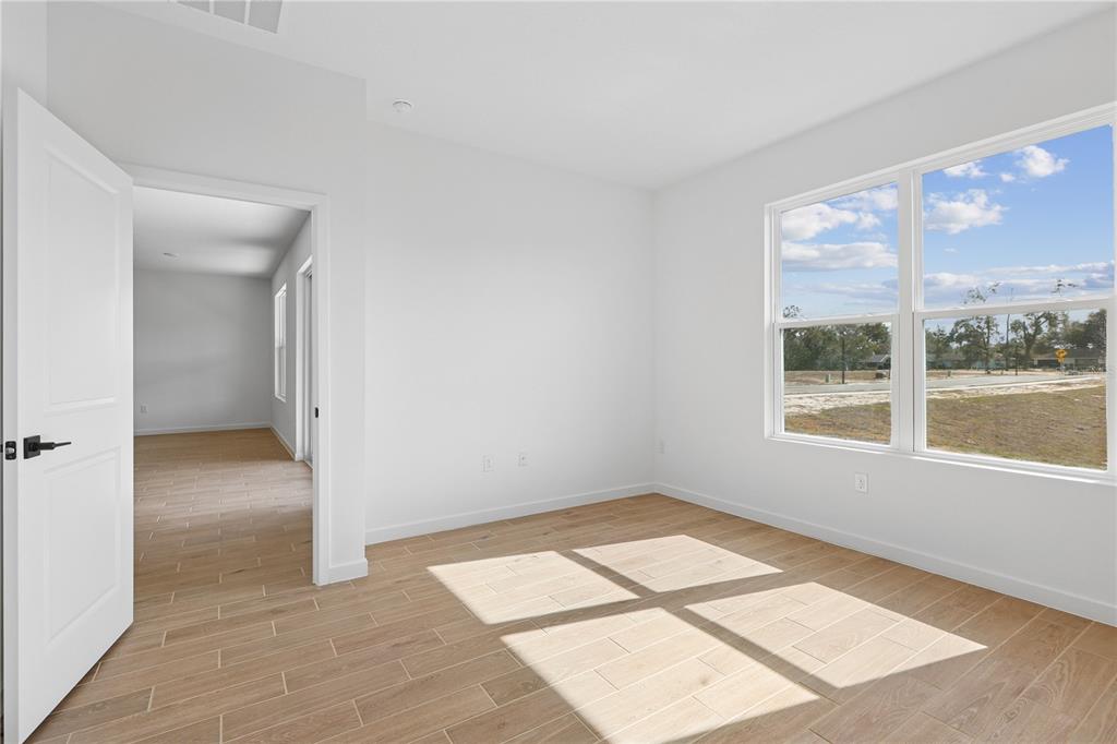 4521 Northwest 37th St Road Ocala, FL 34482 - Photo 11 of 14 a view of an empty room and window