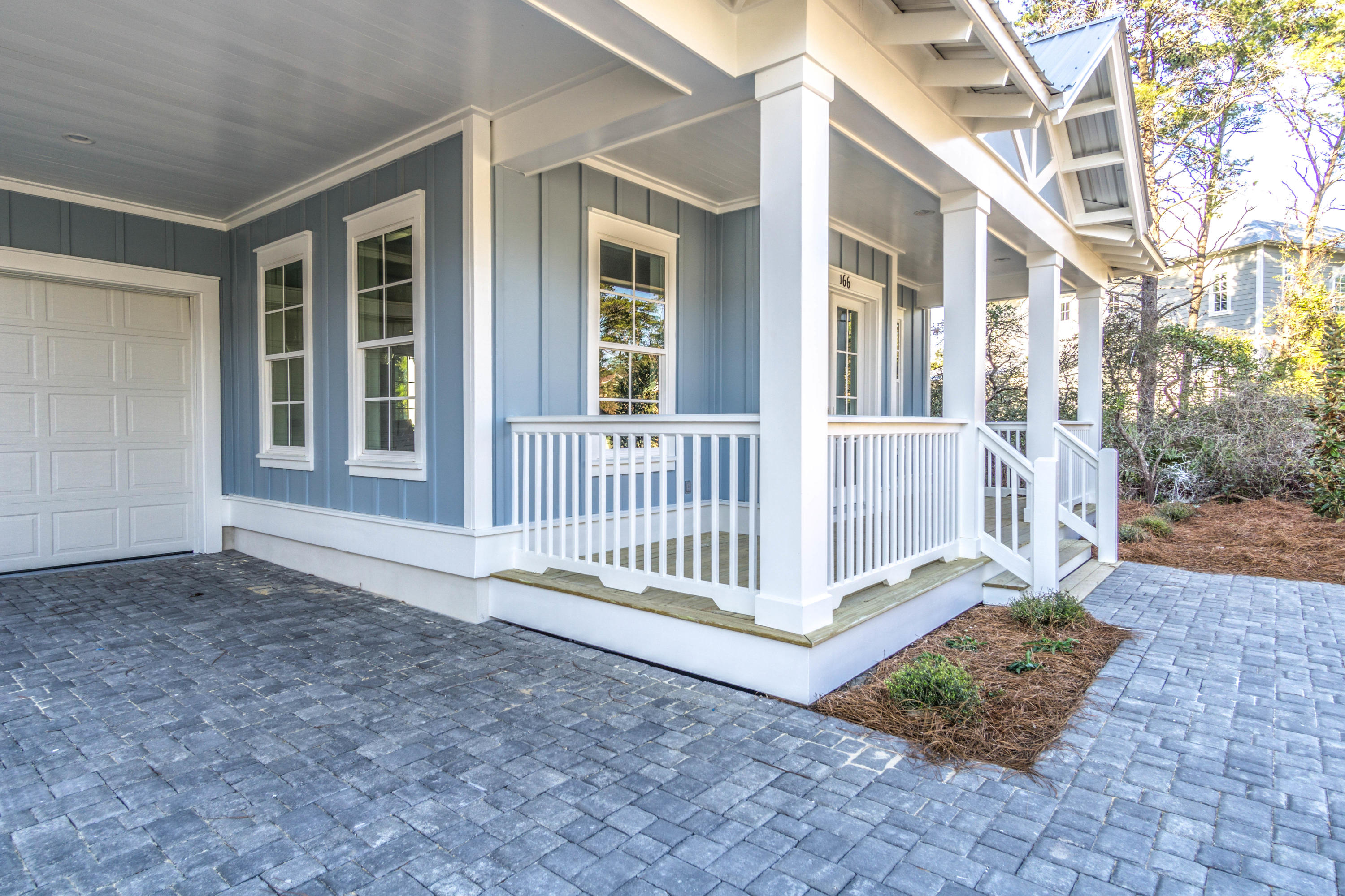 166 Cabana Trail Santa Rosa Beach, FL 32459 - Photo 12 of 62 a view of a house with a small yard and wooden fence