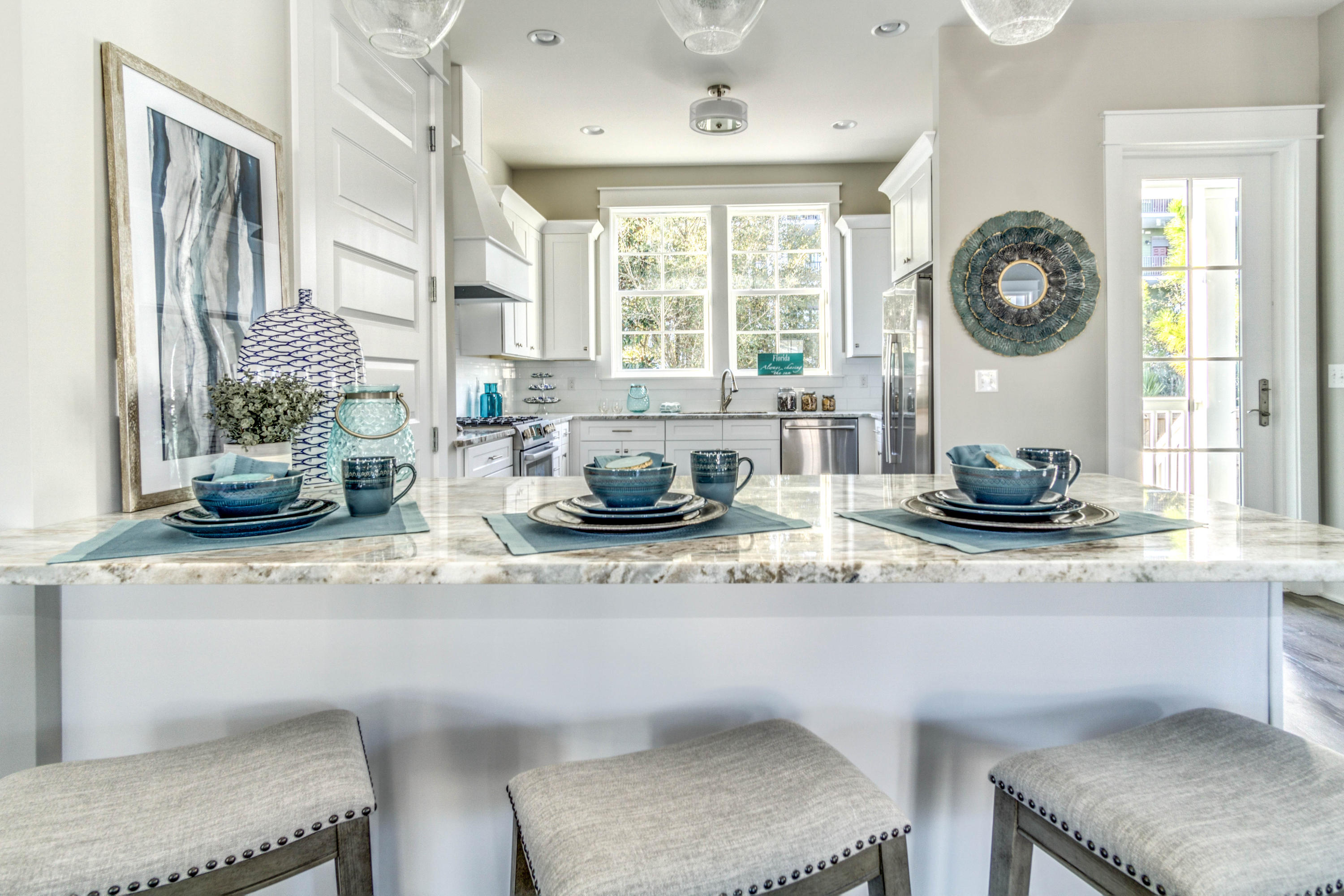 166 Cabana Trail Santa Rosa Beach, FL 32459 - Photo 20 of 62 a kitchen with a window a sink and a table