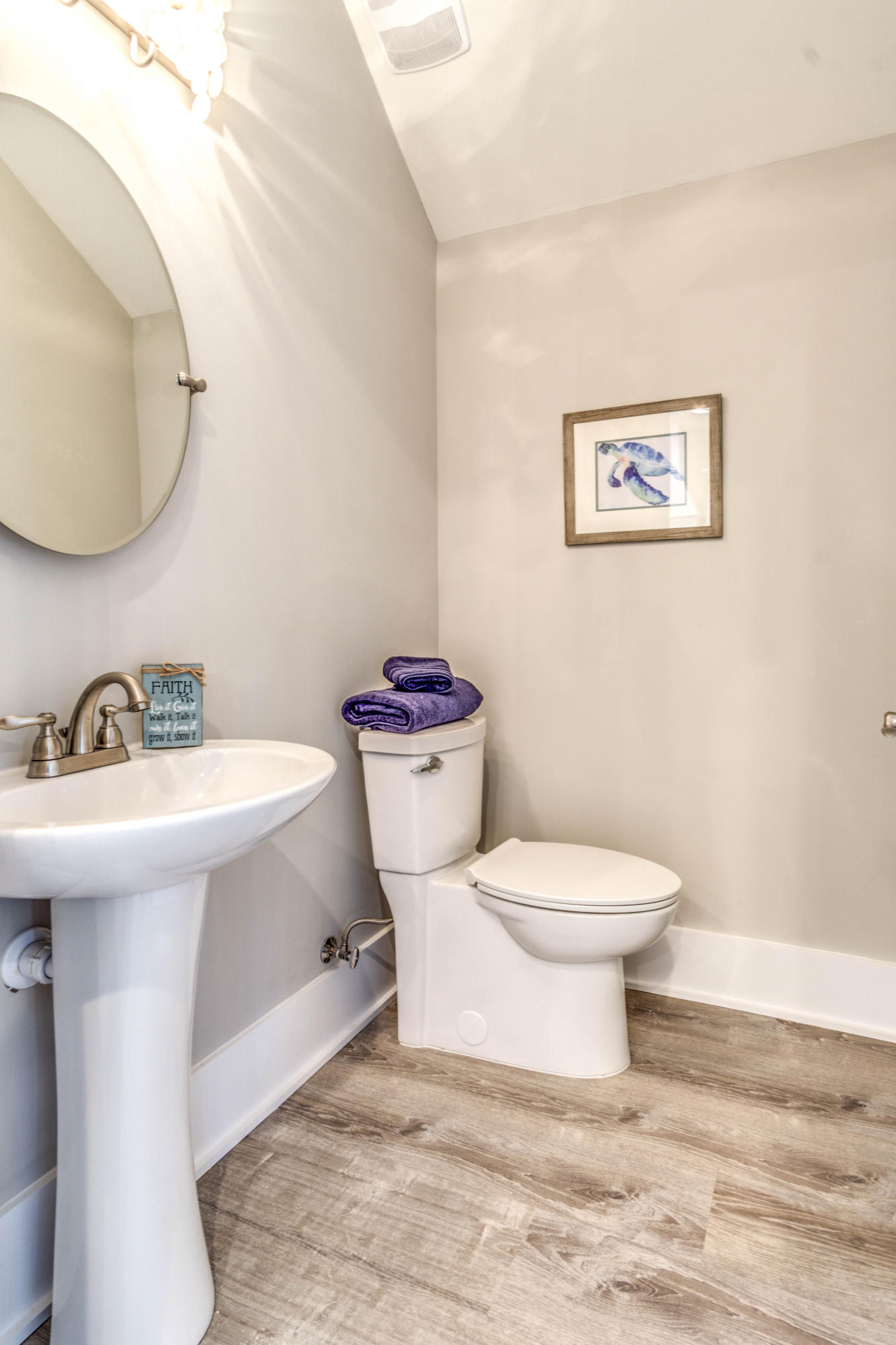 166 Cabana Trail Santa Rosa Beach, FL 32459 - Photo 23 of 62 a white toilet sitting next to a bathroom sink