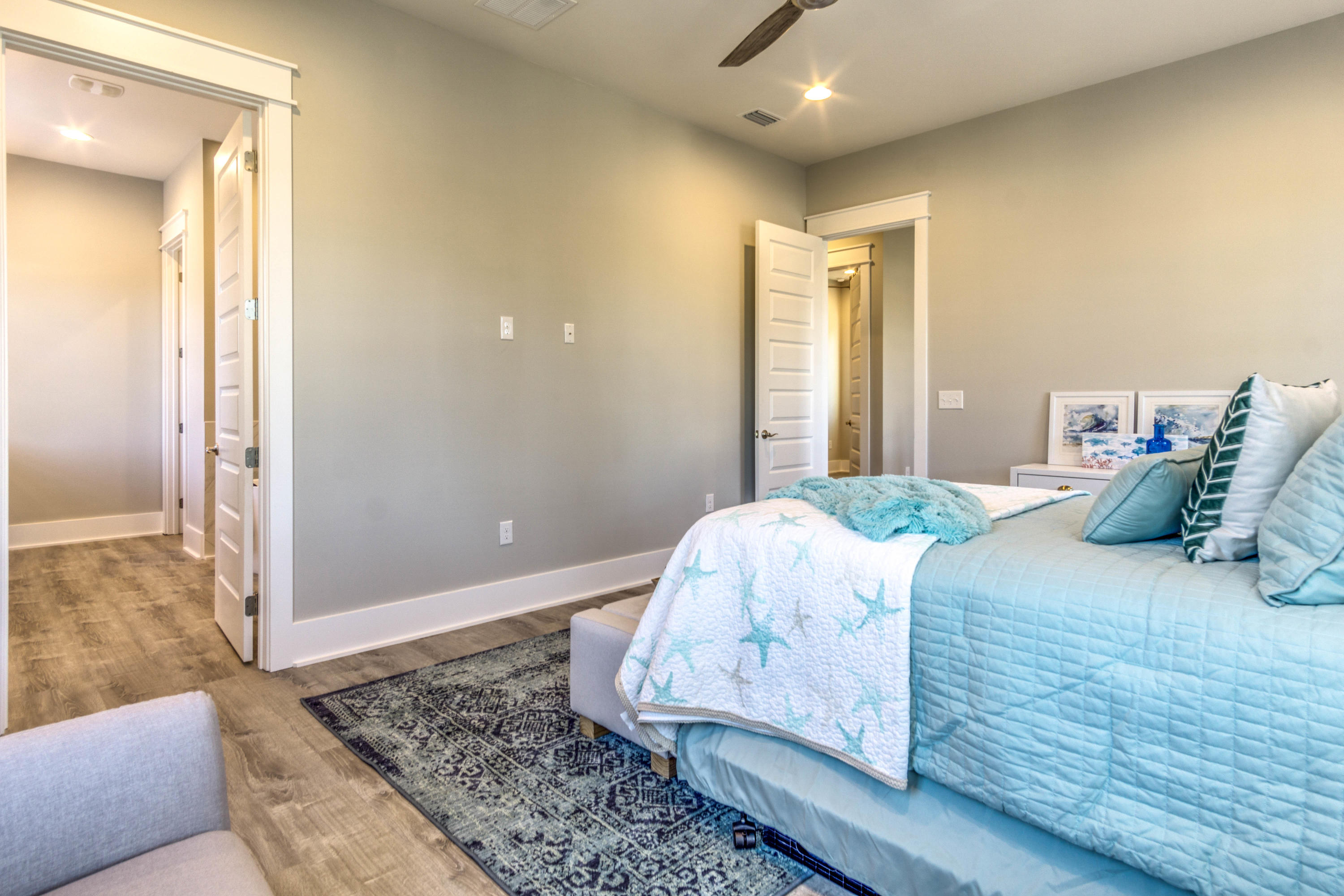 166 Cabana Trail Santa Rosa Beach, FL 32459 - Photo 27 of 62 a bedroom with a bed and a couch