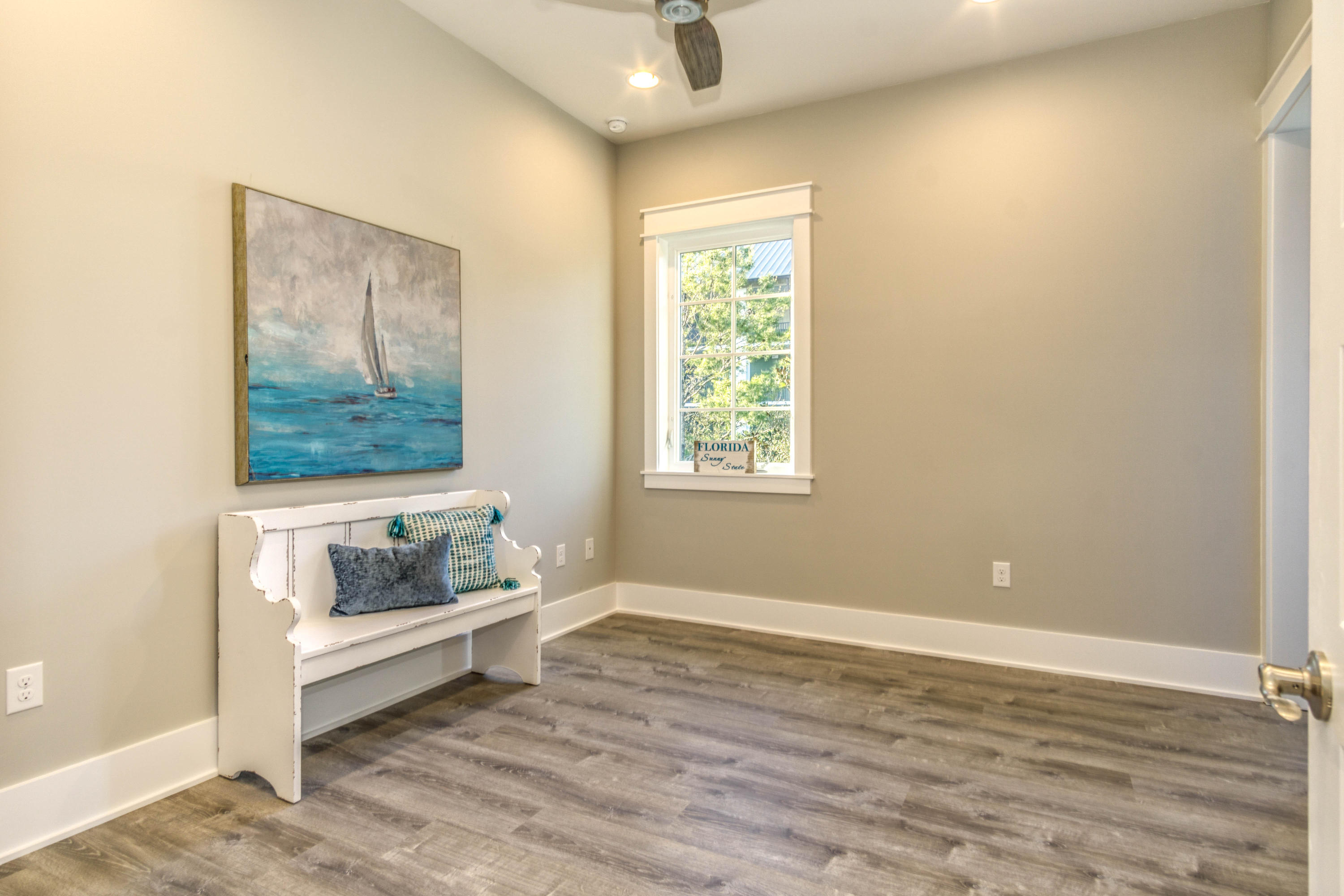 166 Cabana Trail Santa Rosa Beach, FL 32459 - Photo 31 of 62 a view of room with window and wooden floor
