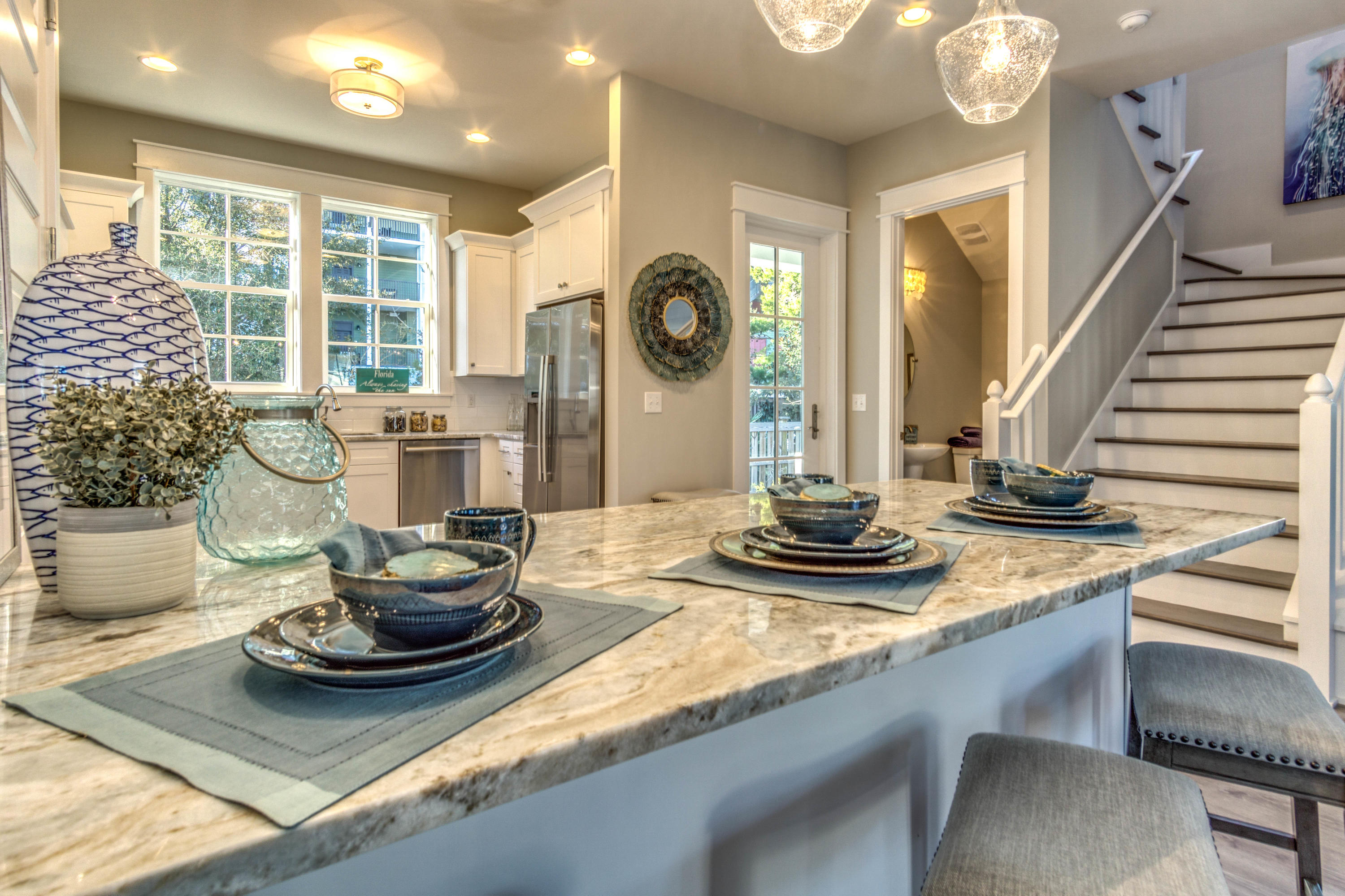 166 Cabana Trail Santa Rosa Beach, FL 32459 - Photo 47 of 62 a kitchen with a stove and a white table