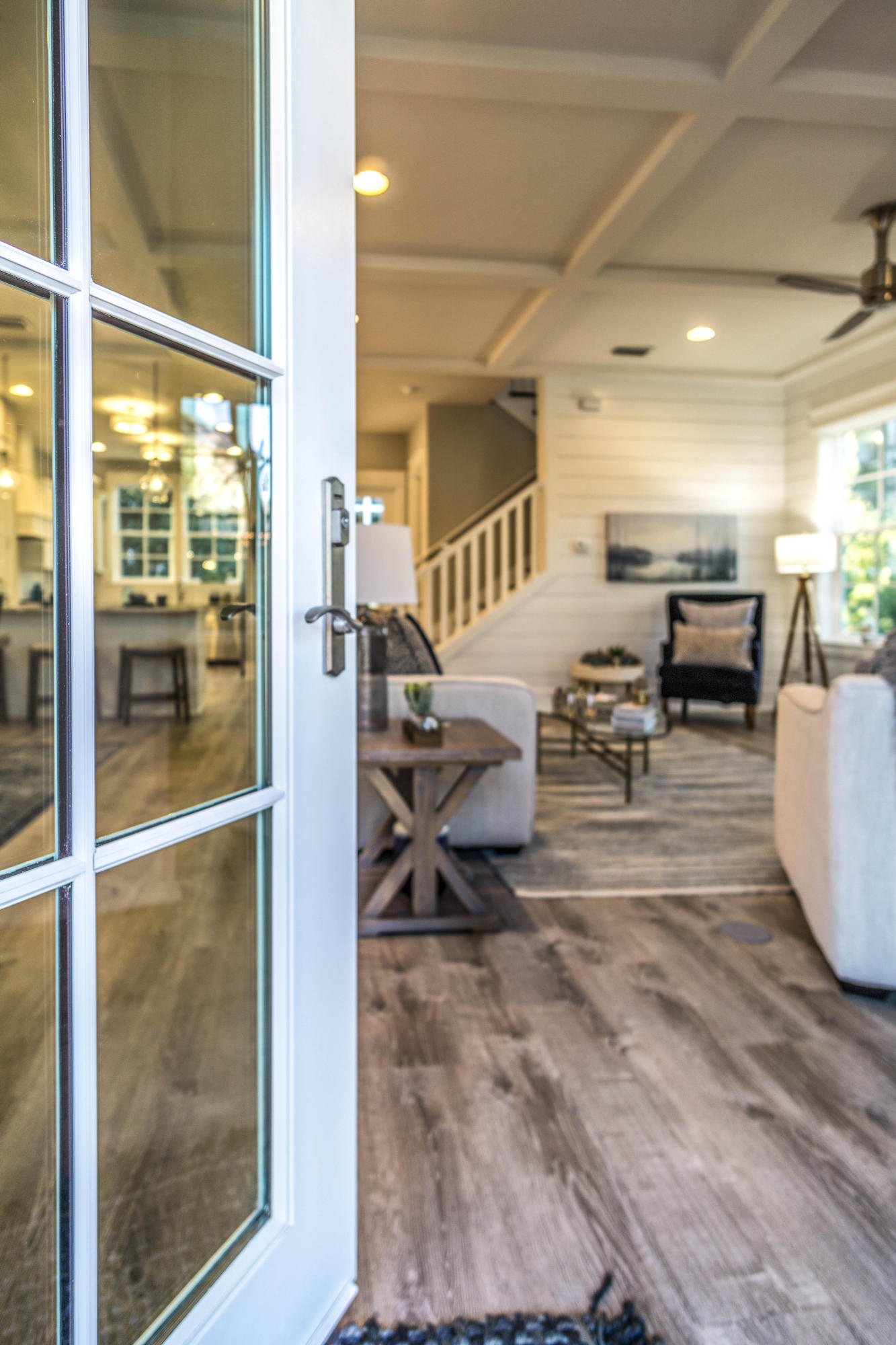 166 Cabana Trail Santa Rosa Beach, FL 32459 - Photo 49 of 62 a living room with couches and kitchen view with wooden floor