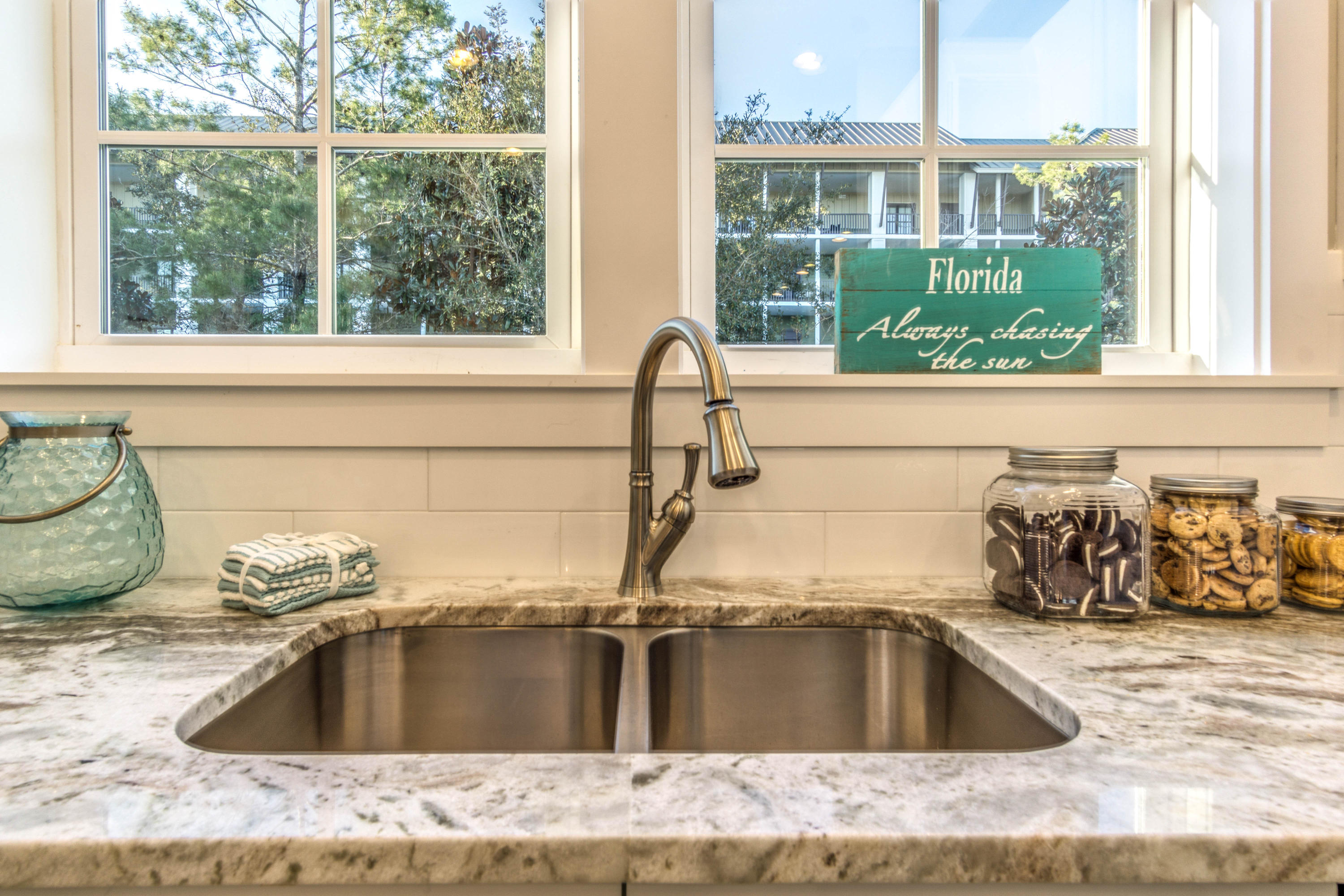 166 Cabana Trail Santa Rosa Beach, FL 32459 - Photo 52 of 62 a kitchen with a sink and a window