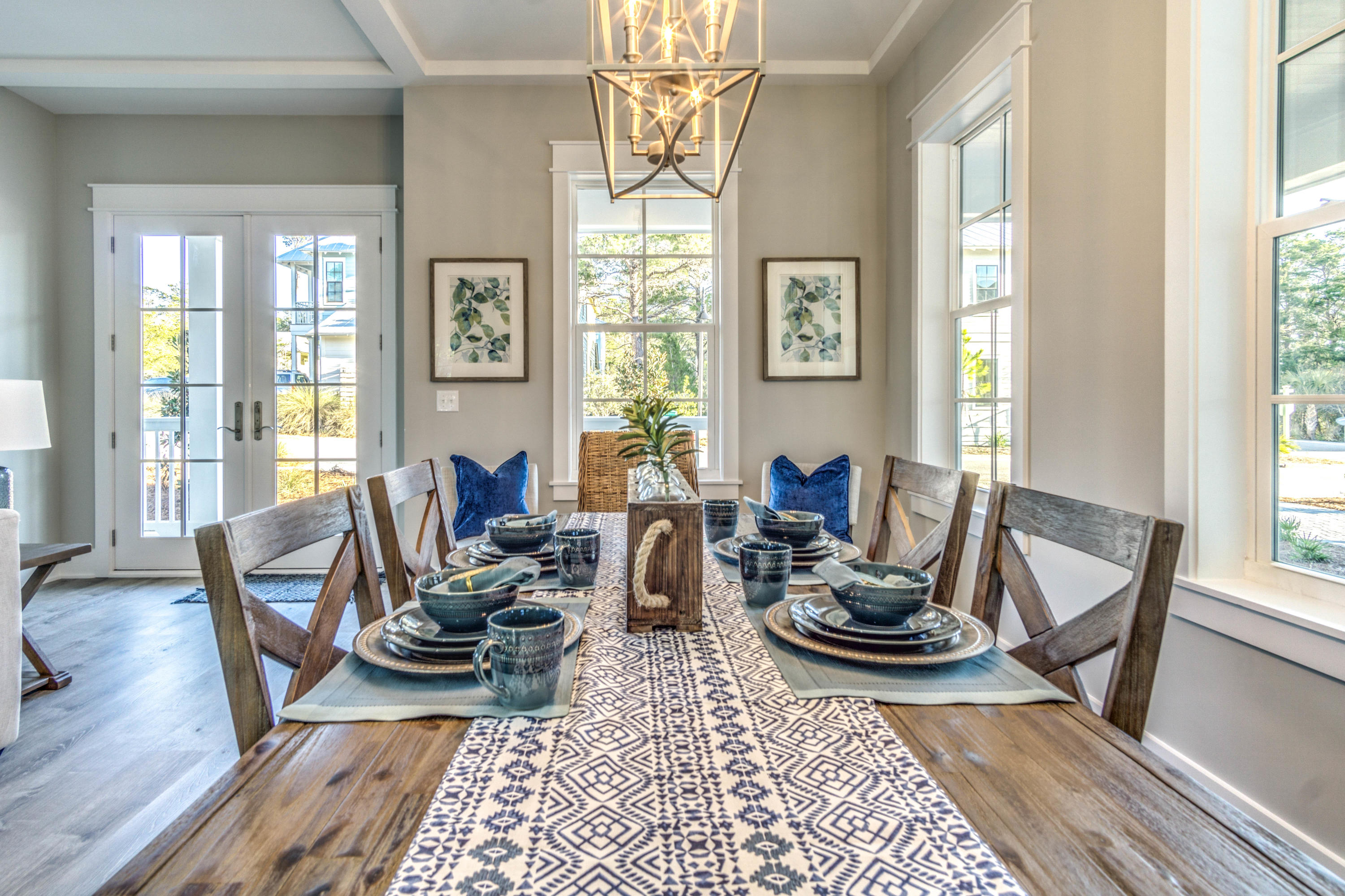 166 Cabana Trail Santa Rosa Beach, FL 32459 - Photo 53 of 62 a living room with furniture a rug a table and a large window