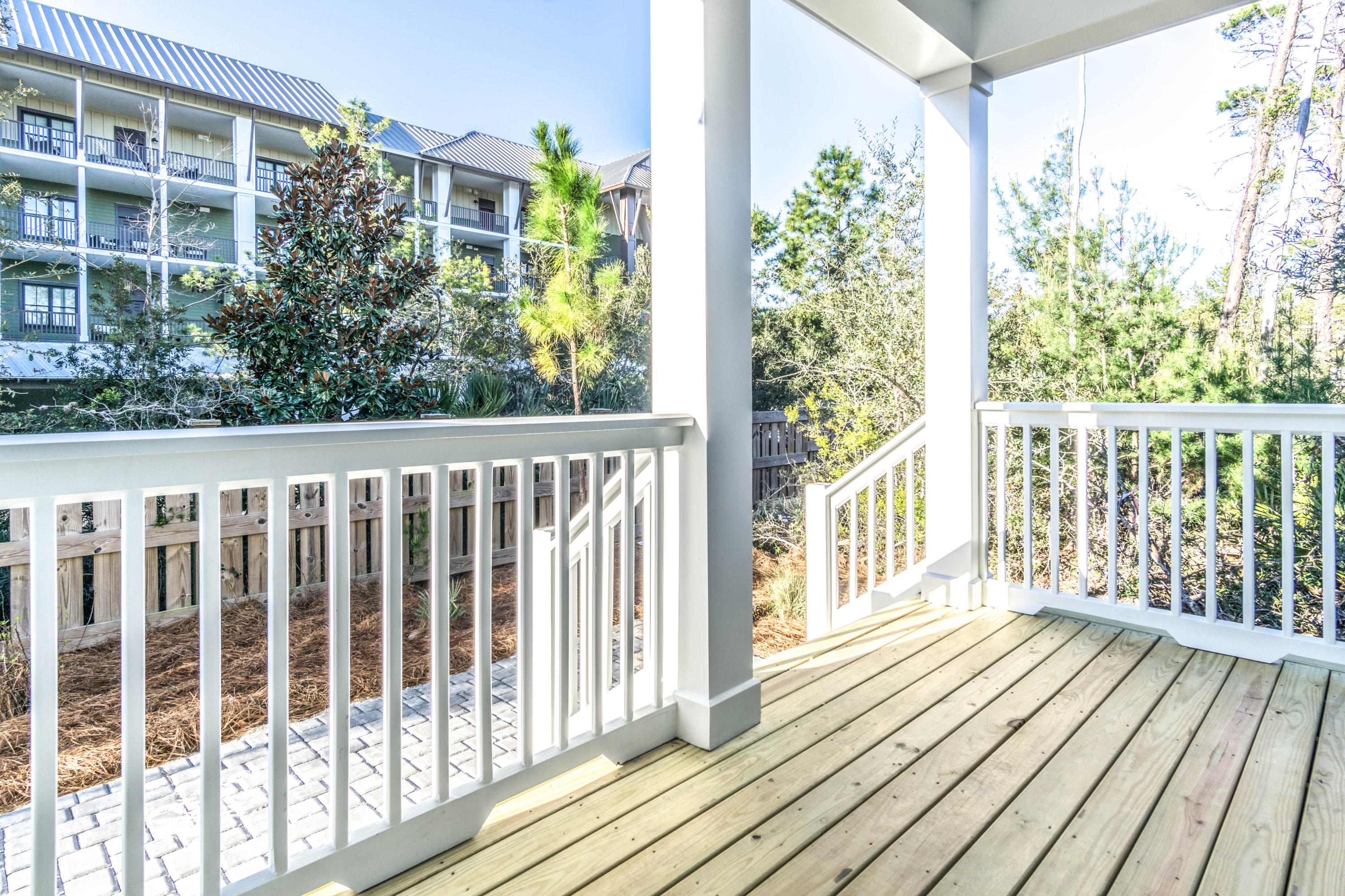 166 Cabana Trail Santa Rosa Beach, FL 32459 - Photo 56 of 62 a view of a balcony with wooden floor