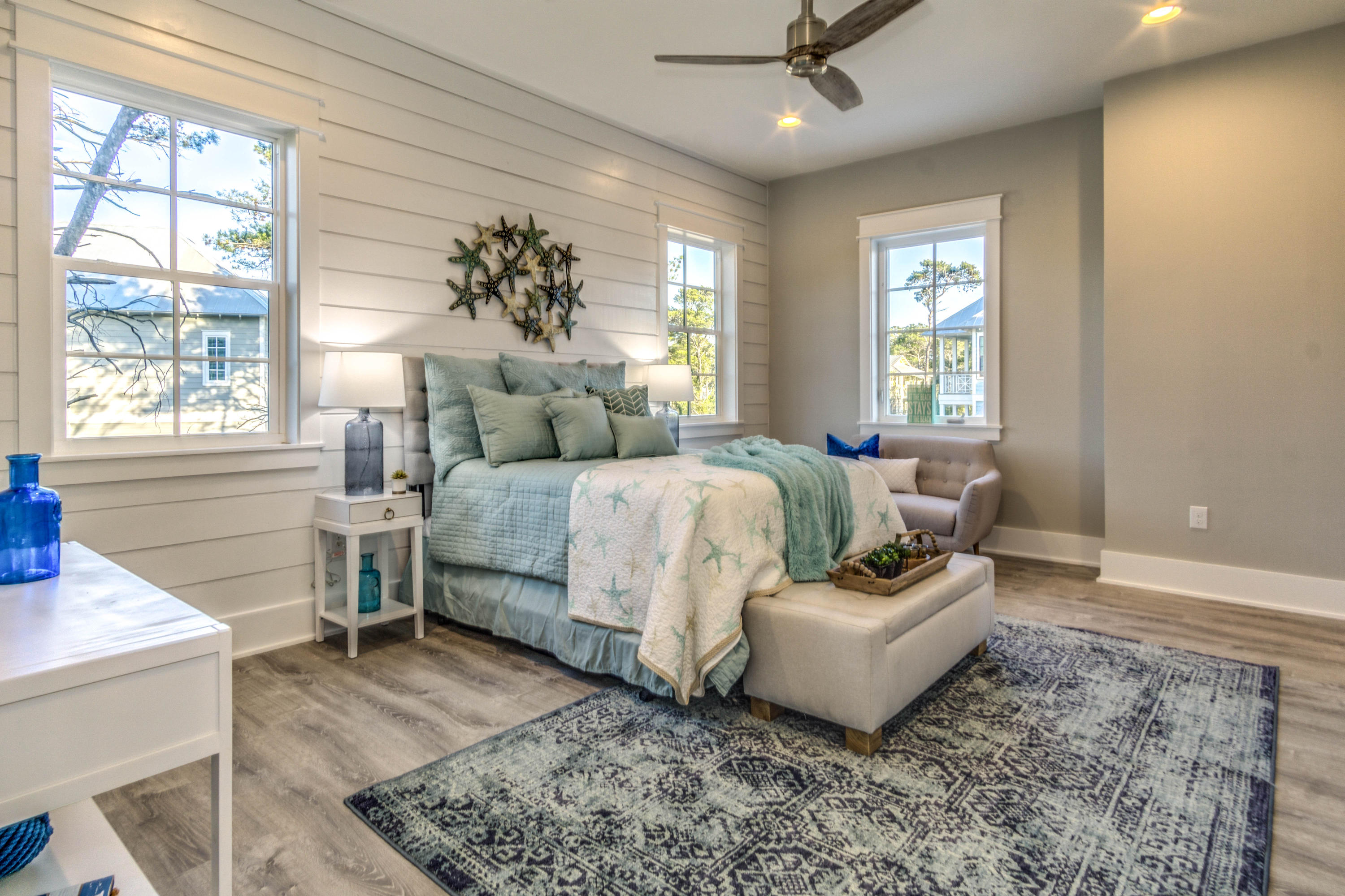 166 Cabana Trail Santa Rosa Beach, FL 32459 - Photo 8 of 62 a bedroom with a bed and wooden floor